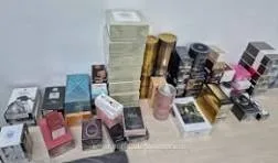 IGPR: 15 percheziţii la persoane care vindeau online parfumuri contrafăcute